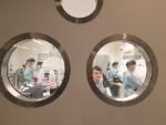 The team inside the special containment lab processing COVID-19 samples