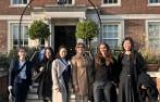 Queen Mary LLM students standing together outside the 3VB offices.