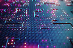 Circuit board in pink, blue and purple hues.