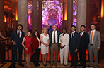 Queen Mary LLM students standing in a pillared hall at the AIEN 2025 conference.