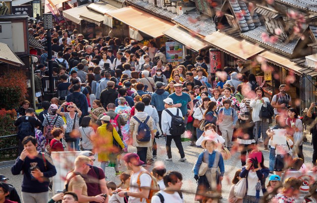 Crowds of people in a shopping district