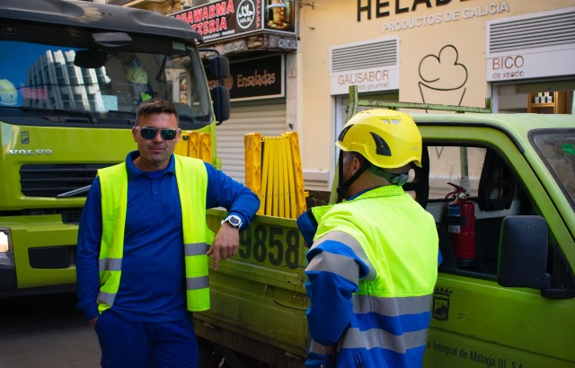 Two key workers talking on the street