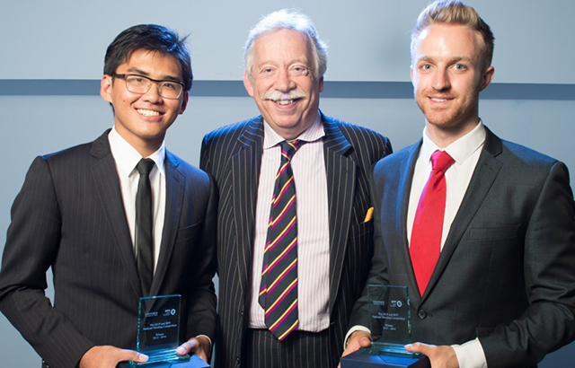 Judge Gratwicke presents Darren Low (left) and Theodore Dyson with their trophies 