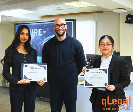 qLegal students with their AI Talks competition awards.