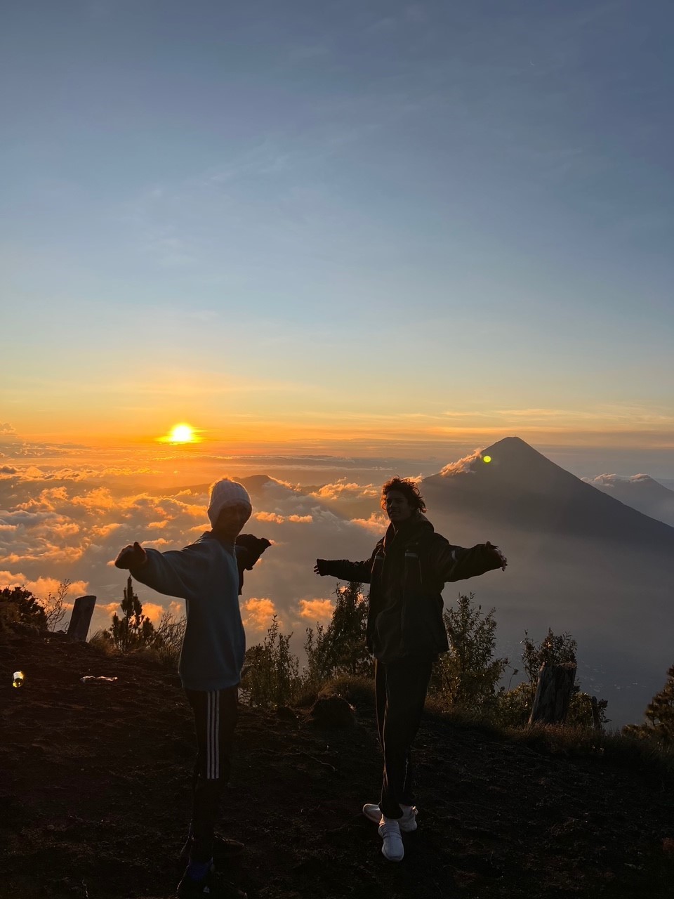 Rohil at the top of a mountain waiting the sunrise