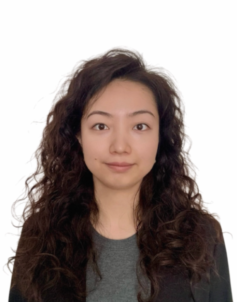 Headshot of Wenqing in grey top, looking at camera with a white background.